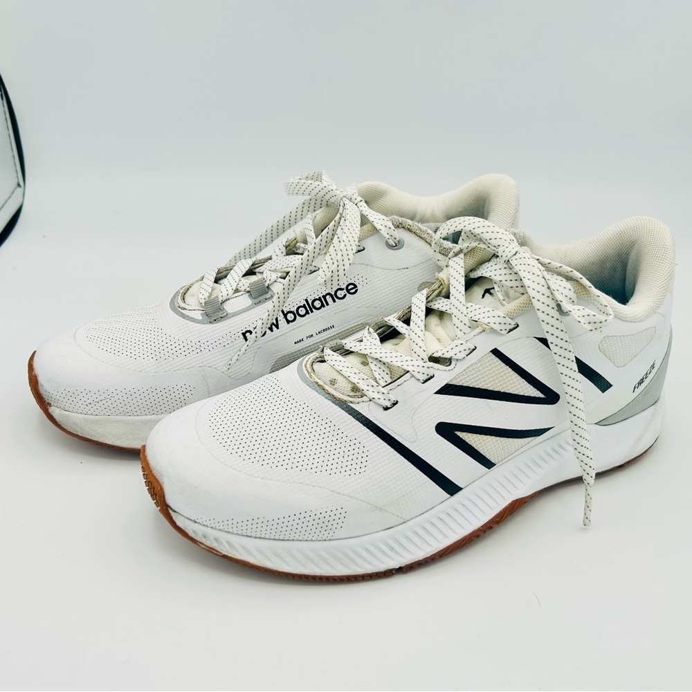New Balance White and Black Athletic Shoes
New Balance FreezeLX v4 Turf